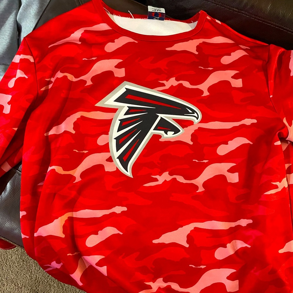 Atlanta falcons sweater. Runs big. Purchased from Mercedes Benz stadium.